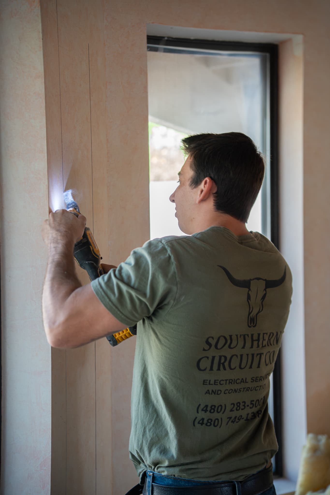 Southern Circuit Co. owner at work in a custom home