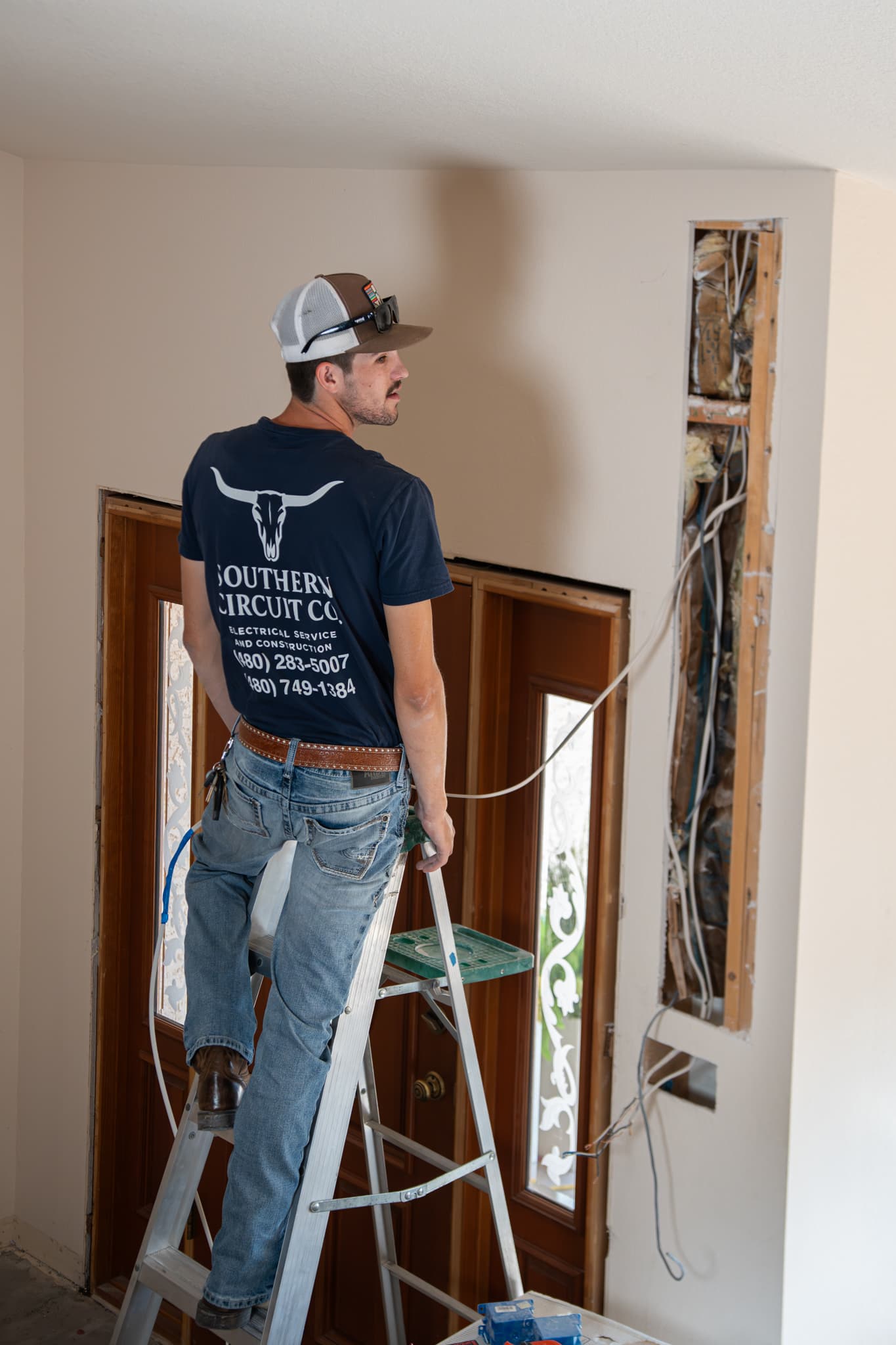 Electrician wiring a remodel in Queen Creek